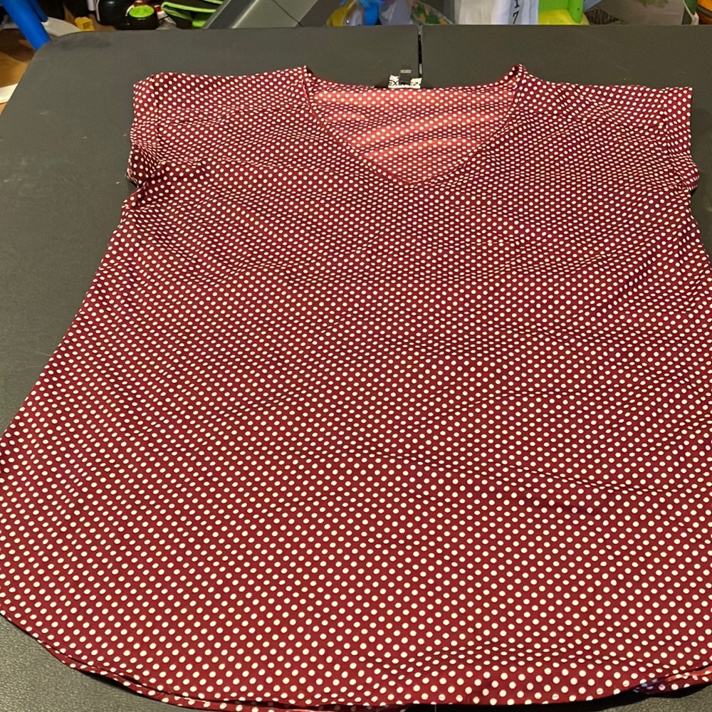 Express cuff arm red polka dot shirt
